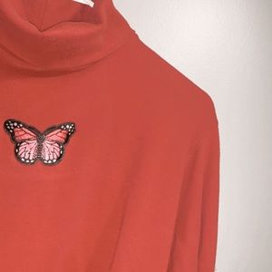 butterfly turtleneck